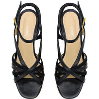 Vista superior del par de sandalias negras mostrando diseño de tiras y plantilla